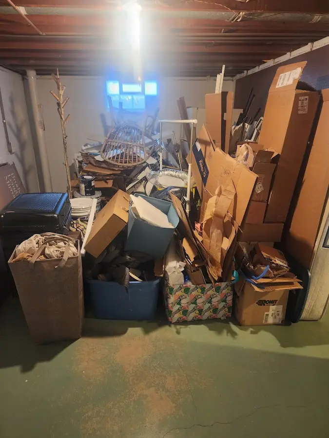 Roll-off dumpster container at job site for 8 Yard Dumpster Rental in Milford